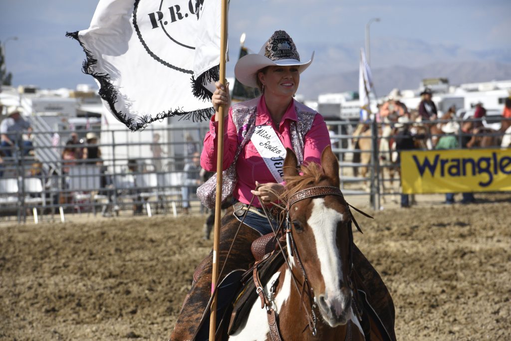 Sara McClain, Miss Rodeo Tehachapi 2015, presenting flags at the 2015 RAM PRCA California Circuit Finals Rodeo