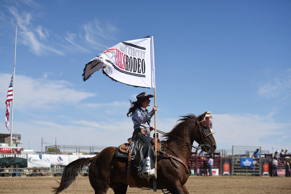 2016 Jurupa Valley Pro Rodeo Queen, Amanda Hopp, presenting the RAM PRCA California Circuit Finals Rodeo Flag at the Circuit Finals - October 2016.