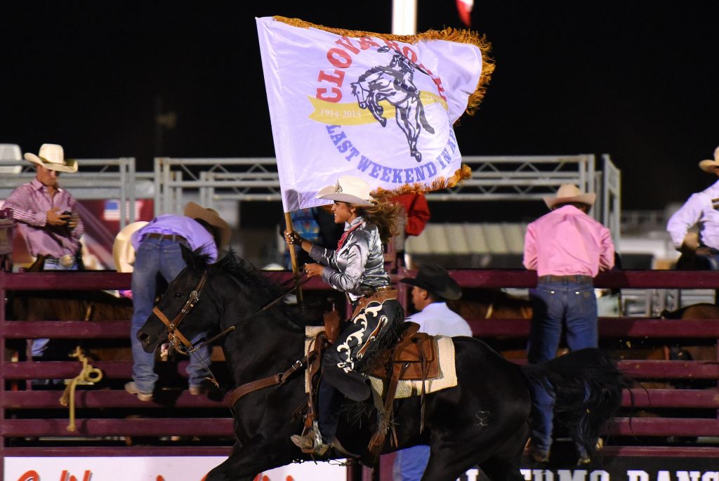 Miss Rodeo Clovis 2016, Katie McDougald, proudly presenting the Clovis Rodeo Flag at the 2016 RAM PRCA California Circuit Finals Rodeo (photo by srn)