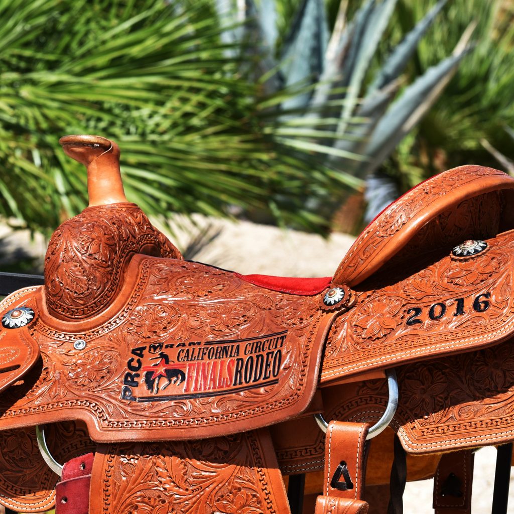 Championship Saddles by Corriente Saddles and sponsored by Western Pacific Roofing Corp, Palm Springs (website); Western Pacific Roofing Corp, Palmdale; Stone Roofing Co Inc. (website), Azusa; and American Services of CA in Hayward and Sacramento (website). 